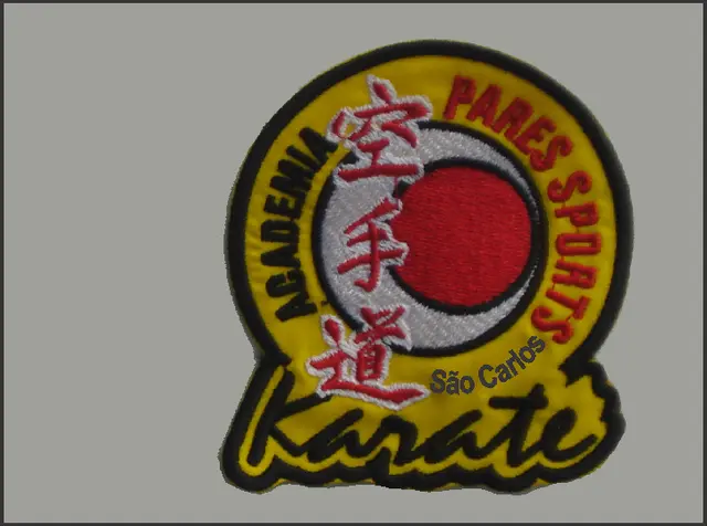 Emblema elaborado pelo designer S. Nakamura e Prof. L. C. Pares (2009)